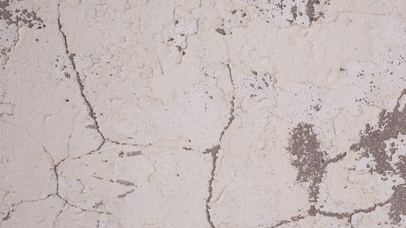 Crazed and cracked render before repair