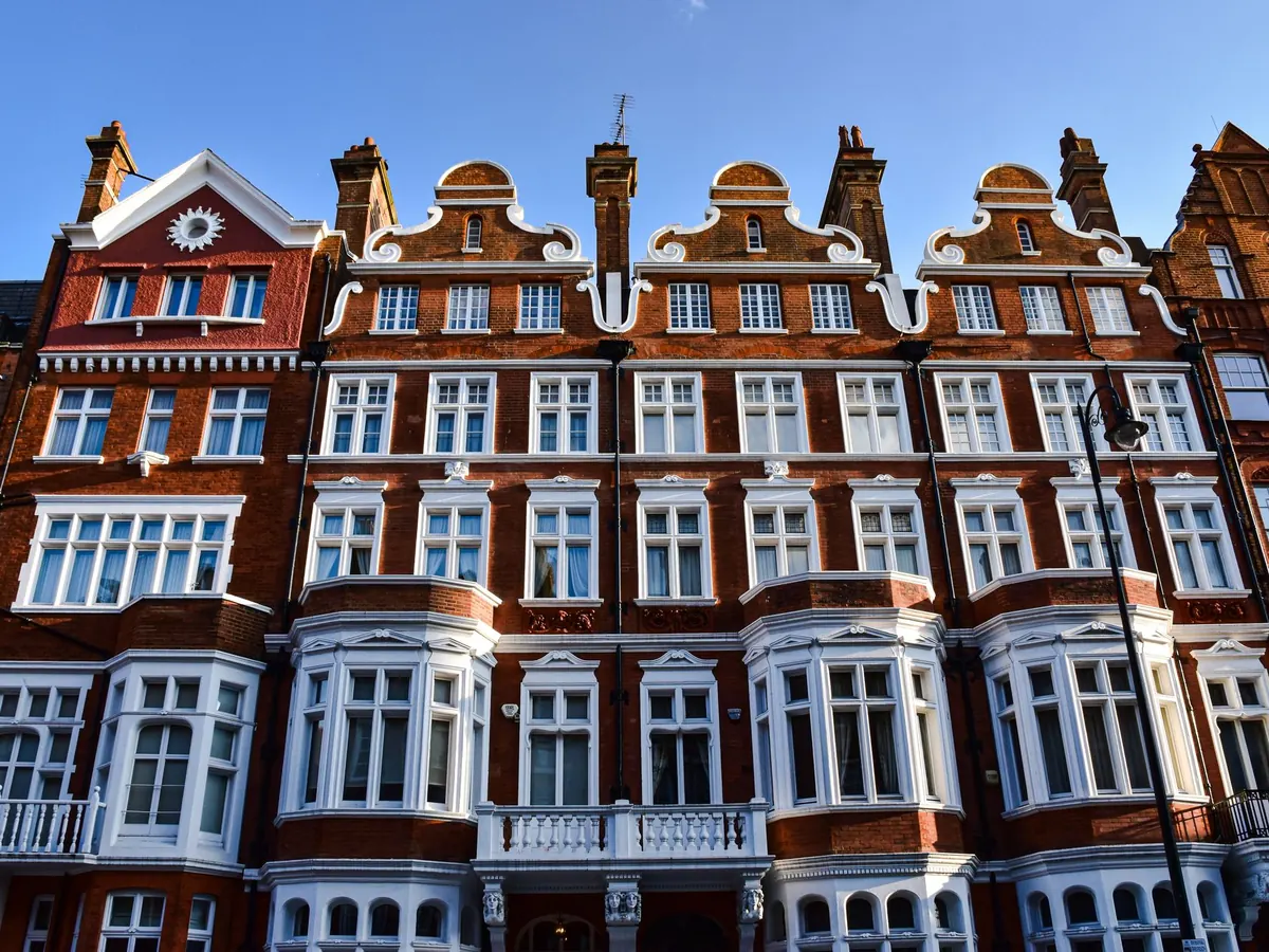 Red brick mansion block frontage typical of inner London